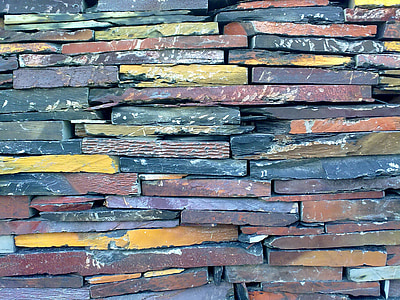 closeup photo of assorted-color of wall bricks thumbnail
