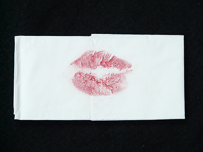 red lip mark on white paper thumbnail
