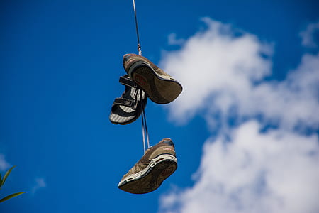 brown-and-black running shoes thumbnail