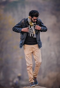 man wearing black leather jacket thumbnail