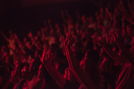 crowd raising their hands thumbnail