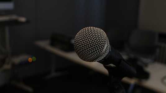 close-up photo of microphone with stand thumbnail