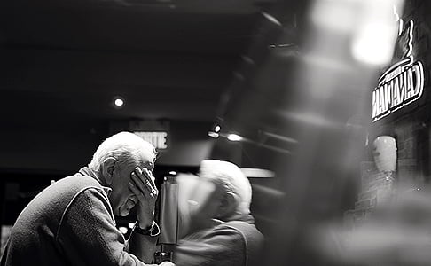 grayscale photo of man in suit thumbnail