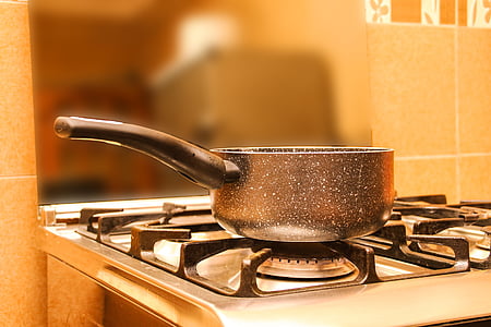 black cooking pot on gas range oven thumbnail