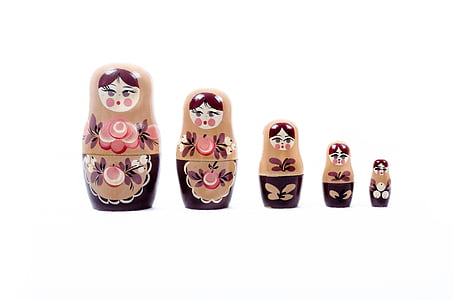 photo of five staggered height matriyoshka figurines thumbnail