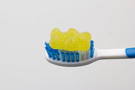 closeup photo of gummy bear on toothbrush thumbnail