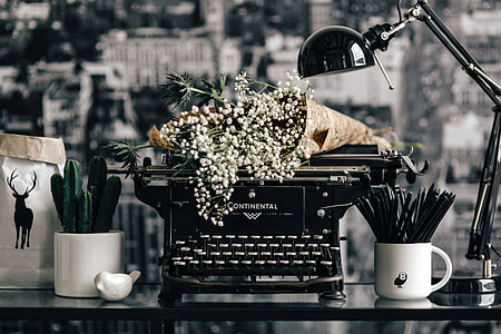 Black vintage typewriter thumbnail