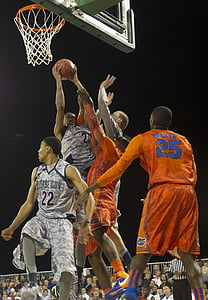 five basketball players playing basketball thumbnail
