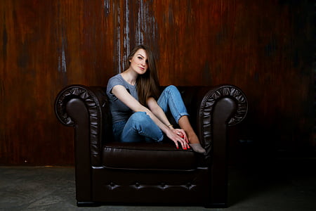 woman sitting on armchair thumbnail