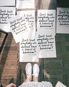 Woman Wears Pair of White Low-top Sneakers thumbnail