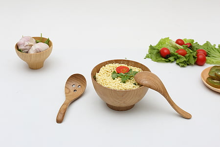 brown wooden bowl filled with noodle thumbnail