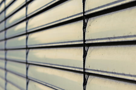 closed window blind in close-up photography at daytime thumbnail