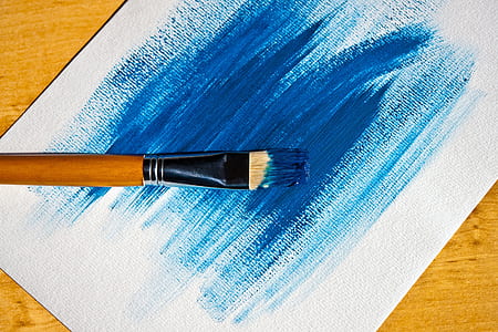 brown paint brush on white board thumbnail