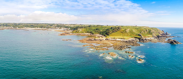 aerial photography of island at daytime thumbnail