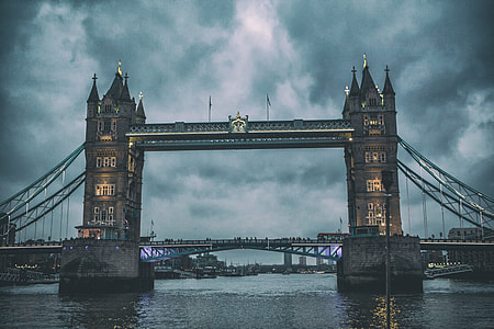 Wide angle shot of Tower Bridge in London at dusk on a grey day thumbnail