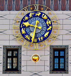 round gold-colored analog wall clock thumbnail