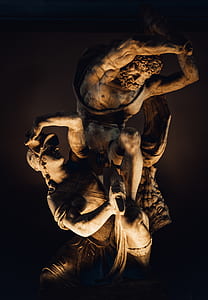 two men fighting brown statue thumbnail