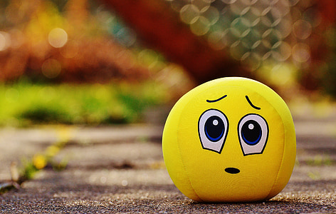 closeup photo of yellow emoji plush toy thumbnail