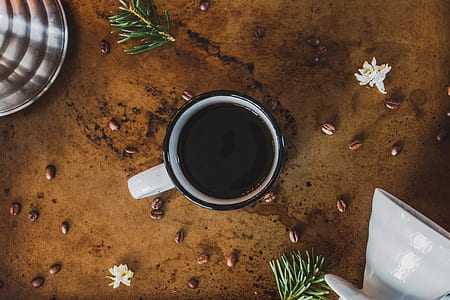 white and black ceramic mug thumbnail