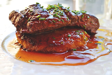 cooked meat on white ceramic plate thumbnail