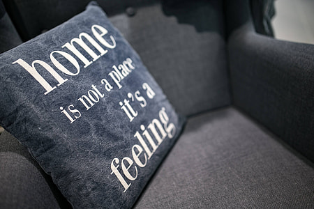 Collection of grey and white pillows thumbnail