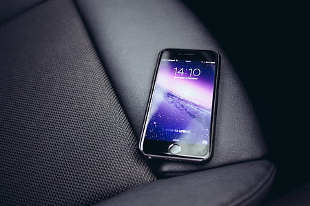 black iPhone 7 on black leather textile turn on thumbnail