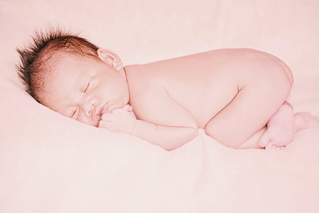 baby sleeping white surface thumbnail