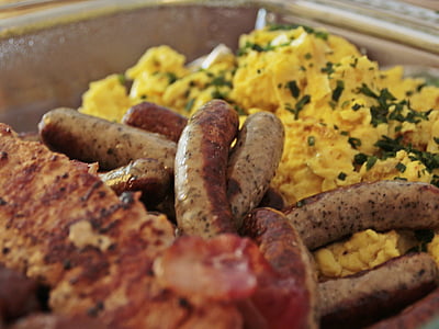 cooked scrambled eggs and sausages thumbnail