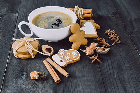 teacup, cookies, cinnamon rolls, and star anis thumbnail