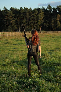 woman holding AR-15 thumbnail