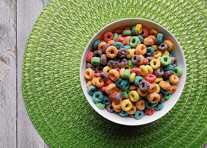 bowl of cereals on top of green place mat thumbnail