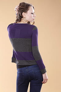 woman posing showing her gray and purple long-sleeved shirt thumbnail