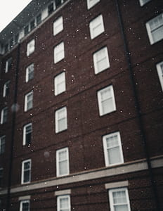 Brown and White Concrete Building thumbnail