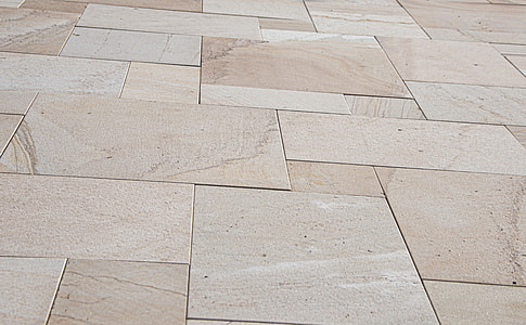 close-up photo of beige ceramic tiled floor thumbnail