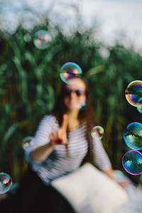 Having fun with soap bubbles in the nature thumbnail