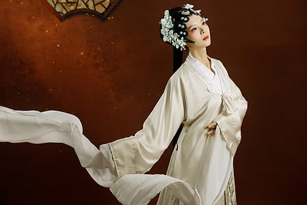 woman wearing white traditional dress thumbnail