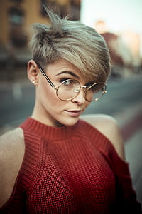 closeup photo of woman wearing eyeglasses and red top thumbnail