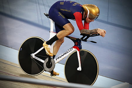 man riding on road bike thumbnail