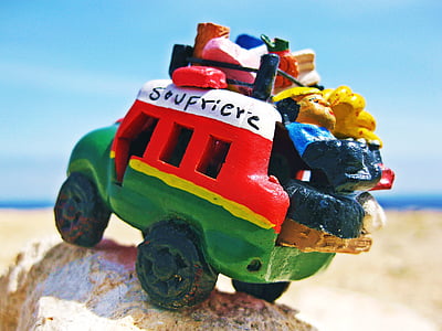 multicolored car toy shallow focus photography thumbnail