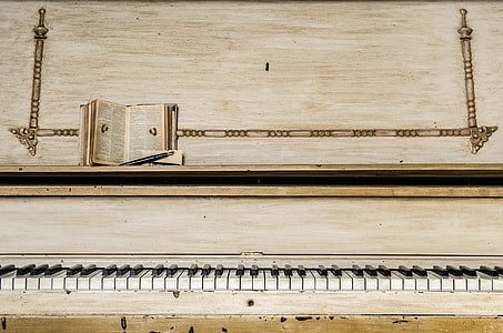 white and black piano thumbnail