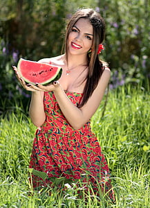 woman holding slice of watermelon fruit thumbnail