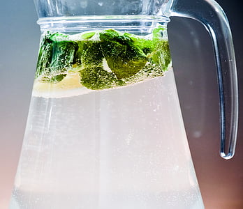 clear glass pitcher filled with white liquid thumbnail