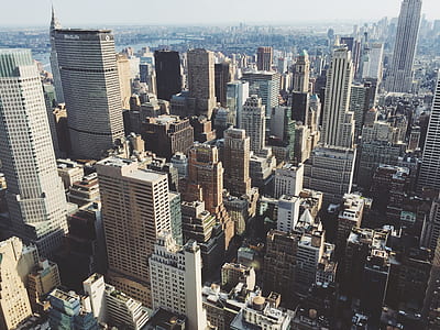 bird's eye photography of high rise buildings thumbnail