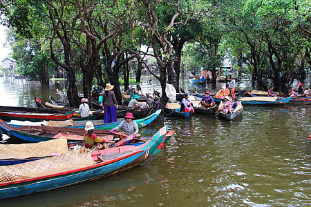persons riding boats thumbnail