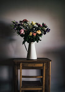 rose flowers in vase on wooden table thumbnail