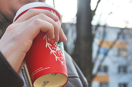 person sipping from cup thumbnail