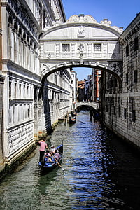 man riding boat in Bridge of Sigh, Venice at daytime thumbnail