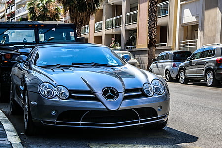 silver Mercedes-Benz SLR McLaren coupe on concrete road at daytime thumbnail
