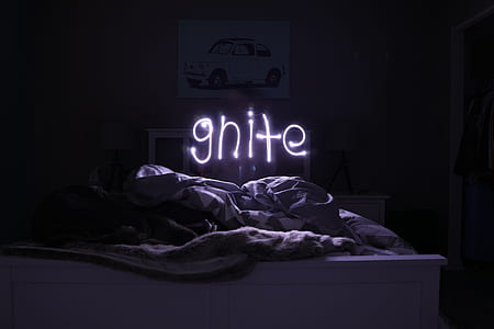 ghite light signage on bed thumbnail