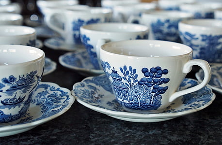 white and blue ceramic teacups and saucers thumbnail